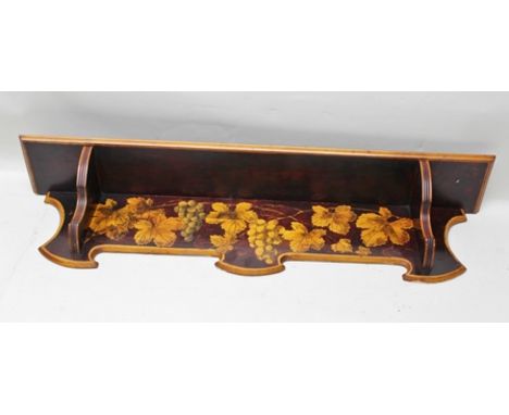 AN EDWARDIAN WALL SHELF with fruiting vine decoration, 100cm wide 