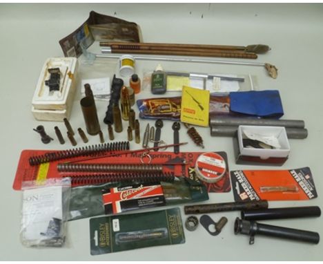 A BOX OF ASSORTED SPARES, TOOLS, CLEANING BRUSHES and a TIN OF .22 "RIMFIRE" BLANKS 