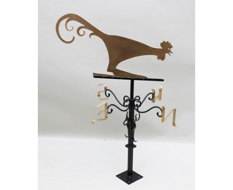 AN ARTS & CRAFTS DESIGN WEATHER VANE, cut out and gilded cockerel mount, on stem with decorative wrought iron wind direction 