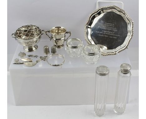 A SELECTION OF SILVER ITEMS, comprising a waiter (engraved) with gadroon rim, rose bowl and grill, a pair of silver rimmed gl