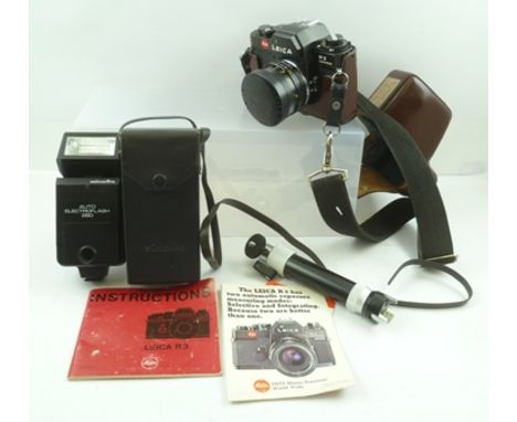 A "LEICA" R3 ELECTRONIC 35MM FILM CAMERA, fitted Leitz Canada Summicron-R 1:2/50 lens, in leather case, together with instruc