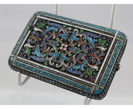 A LATE 19TH CENTURY RUSSIAN SILVER AND ENAMEL CARD CASE, having applied wire work decoration with floral and acanthus leaf pa