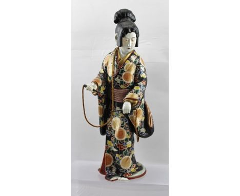 A 20TH CENTURY JAPANESE SATSUMA CERAMIC BIJIN FIGURE with polychrome painted and gilded decoration, 44.5cm high 
