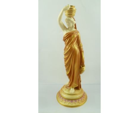 A ROYAL WORCESTER "CRICKLITE" STEM, gilded and painted porcelain, modelled as a classical water carrier, she supports a two-h