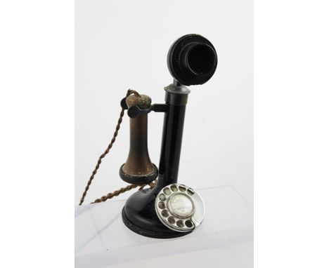 AN EARLY 20TH CENTURY CANDLESTICK TELEPHONE with original black chrome and patinated brass finish with period wiring, 33cm hi