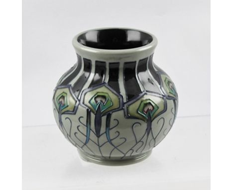 A MOORCROFT CERAMIC VASE, designed by Nicola Slaney, tube lined and hand painted in the "Peacock Parade" pattern, impressed a