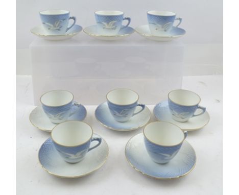 BING & GRONDAHL A SET OF EIGHT COPENHAGEN PORCELAIN COFFEE CUPS AND SAUCERS, with seagull decoration to the cups, pattern no.