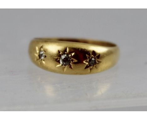 AN EDWARDIAN 18CT GOLD SET DIAMOND THREE-STONE GYPSY SET DRESS RING, Chester 1902, size R 1/2, 5g. gross 