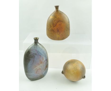 ANNE JAMES (1937- ) THREE PIECES OF STUDIO POTTERY, includes two narrow neck flask vases, and a globular vase with three susp