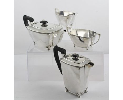 HARRISON BROTHERS & HOWSON (George Howson) AN ART DECO INSPIRED FOUR-PIECE SILVER TEA SET, comprising teapot, hot water jug, 