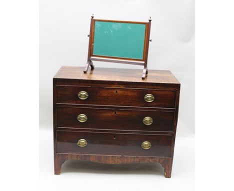 A 19TH CENTURY MAHOGANY CHEST of three long drawers fitted brass handles, raised on bracket feet supports, 91cm wide, togethe