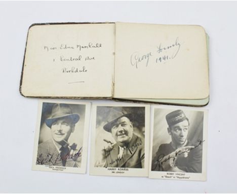 A POCKET AUTOGRAPH BOOK contains autographs to include, George Formby, Jack Warner, Arthur Askey, together with three autogra