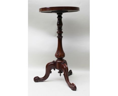 A VICTORIAN MAHOGANY WINE TABLE having dished top, on ring turned stem with fluted tear drop base, on triform cabriole scroll