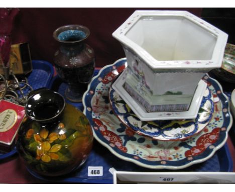 A Circa 1900 Globular Jug, hand painted decoration of flowers and foliage on a shaded brown and black ground impressed marks 