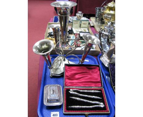 A Victorian Silver Plated Table Epergne, with four detachable flutes, a cased pair of silver plated nutcrackers and a small n