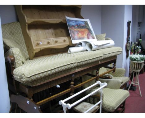 An Ercol Three Seater Settee, high and low back easy chairs, all with arched and spindle design.