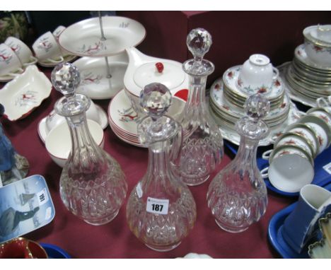 Four Matching Decanter Set, featuring claret jug, twin and smaller example with fluted neck and slice cut decoration to bulbo