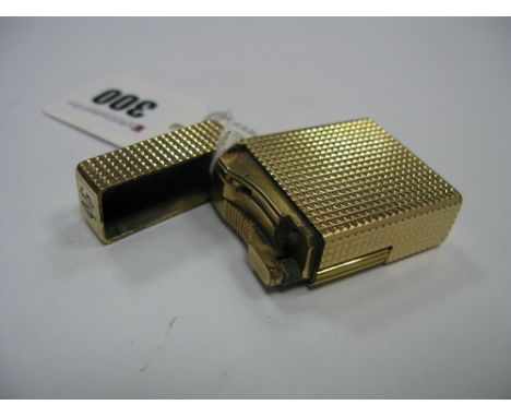 A Dupont Gold Plated Cigarette Lighter, of textured design, initalled "MG". 