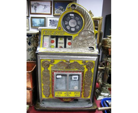 A Table Top Slot Machine, stamped made in the United States, patent 94718 and 94719, cast metal body with minor signs of late