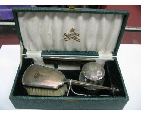 A Hallmarked Silver Mounted Three Piece Set, comprising hair brush, comb and trinket jar, each engine turned, in original fit