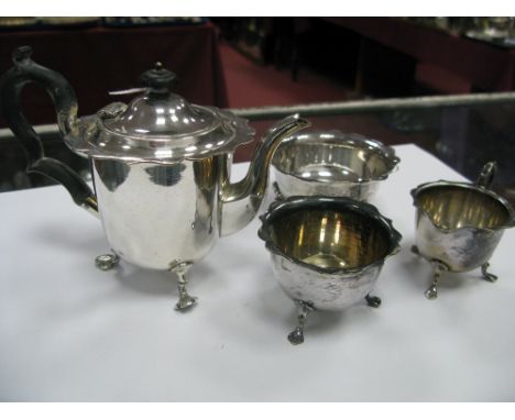 A Hallmarked Silver Sugar Bowl, with wavy edge, raised on three pad feet; together with a plated bachelors three piece teaset