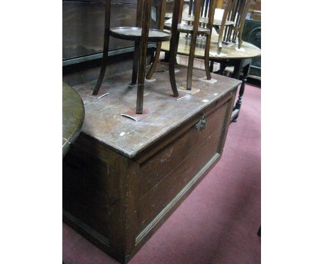An Early XX Century Stained Pitch Pine Chest, recessed side panel fitted with brass drop handles.
