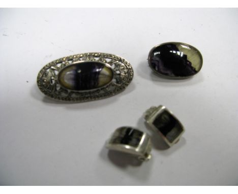 A Blue John Oval Panel Brooch, together with another brooch, within marcasite set border, a pair of clip earrings, stamped "9