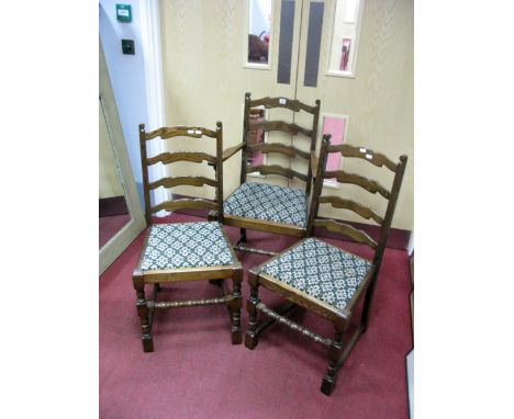 A XX Century Set of Six Ladder Back Chairs, two arms, four single chairs, with drop in seats, on turned and block supports.