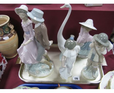 Five Nao Figurines, including courting couple, lamb carrier.