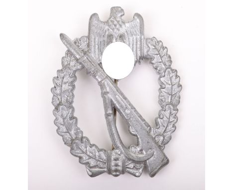 GERMAN WWII ARMY INFANTRY ASSAULT BADGE IN SILVER, is solid-back slightly vaulted w/ a “Adolph Scholze” makers logo, zinc, re