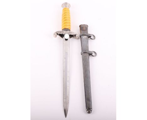 WW2 GERMAN ARMY OFFICERS DRESS DAGGER BY CARL EICKHORN, SOLINGEN, with yellow celluloid grip, pommel and cross guard appear t