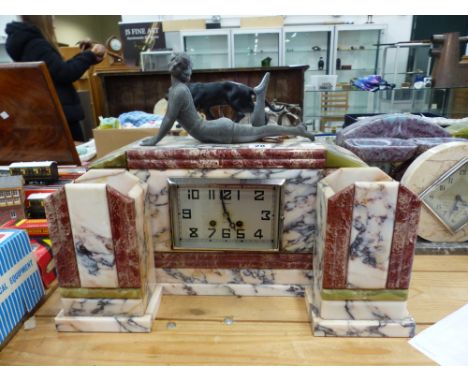 AN ART DECO VERIEGATED MARBLE MANTLE CLOCK GARNITURE SURMOUNTED WITH GIRL IN SWIMSUIT.