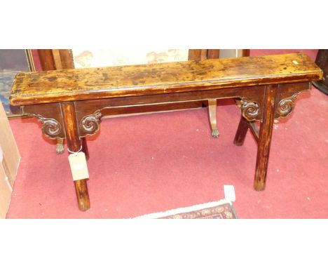 An Oriental stained hardwood two-seater bench, having scroll floral decoration and raised on plain turned supports, length 11