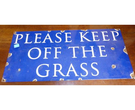 An enamel on metal wall sign titled Please Keep Off The Grass, 28 x 60cm