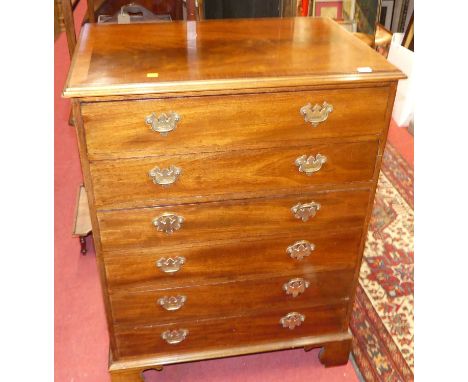 A flame mahogany and cross banded chest of six long drawers, width 83cmHeight 110cm, width 83cm, depth 58cm.Some light marks,