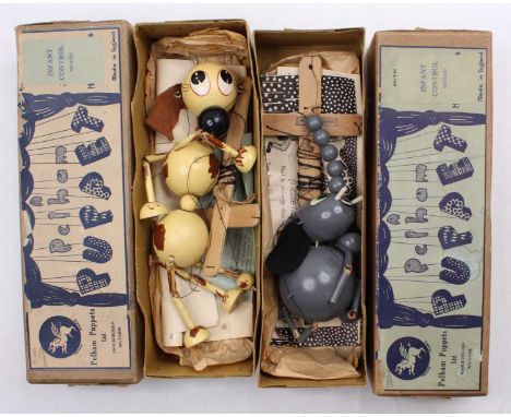 2 boxed vintage Pelham Puppets, with one being an Elephant, and the second a DogElephant – some paint loss, heavily tangled, 
