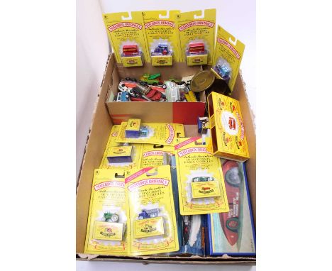 A collection of mixed loose and boxed diecasts, with examples including some Matchbox Series 'Originals', reproductions of ea