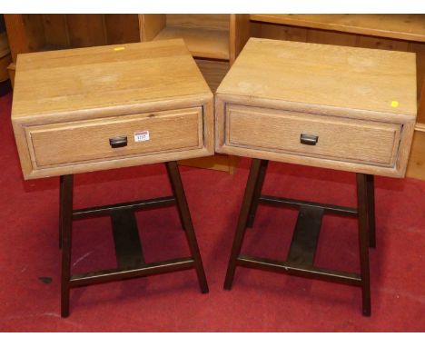 A pair of contemporary limed oak and anodised metal single drawer lamp tables, w.42cm 