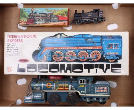 A Daiya of Japan large scale tinplate and clockwork friction drive locomotive, together with a boxed tinplate friction drive 