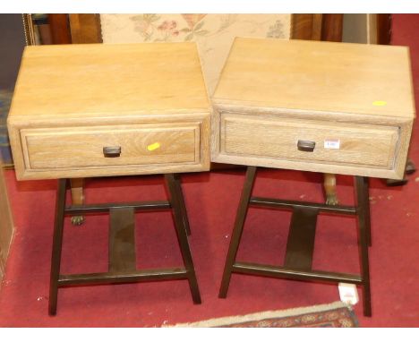A pair of contemporary limed oak and anodised metal single drawer lamp tables, width 42cm