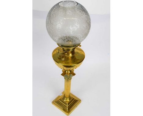 Victorian brass oil lamp with white floral decorated shade on Corinthian column with brass reservoir, 53cm high
