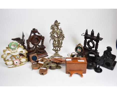 Quantity of late 19th century watch holders, some wood with painted designs, pottery example, and other ceramic examples (qty