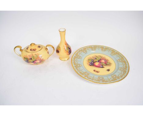 Three pieces of fruit decorated Aynsley wares including a sucrier and cover, cabinet plate and a vase all signed by D Jones (