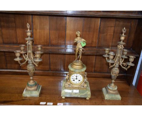 Late 19th/early 20th century French three piece clock garniture, comprising a green alabaster mounted clock with figural meta