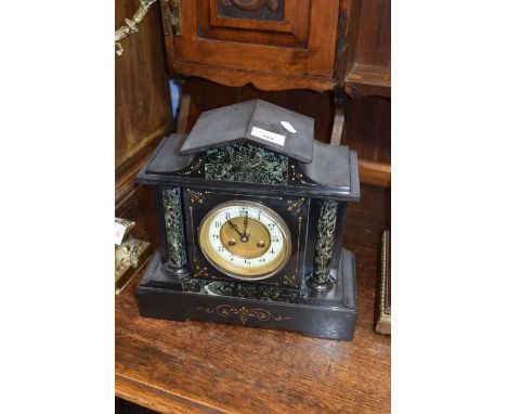 Victorian black slate and grey marble cased mantel clock, the enamelled dial with Arabic numerals to a brass movement strikin