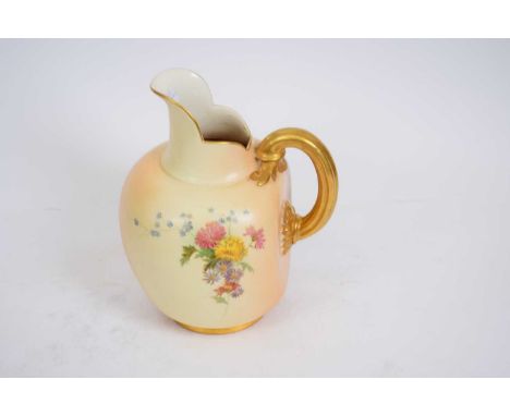 Large Royal Worcester ewer, the blush ground decorated with flowers
