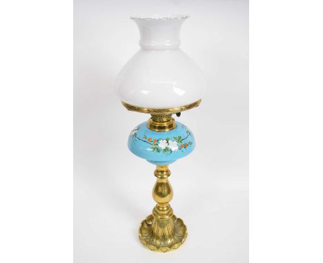 Brass oil lamp with blue ground ceramic reservoir decorated with flowers68cm long