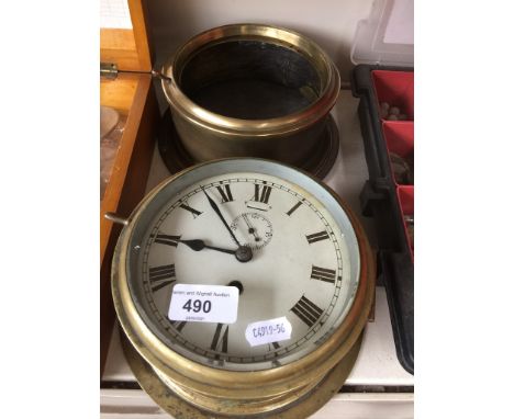 A brass ships clock and another brass case 