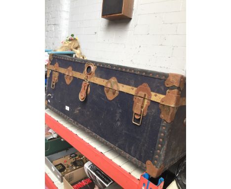 A large vintage travel trunk 