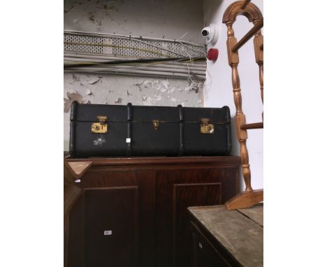 A large vintage travel trunk 